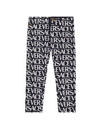 VERSACE ALL OVER LOGO DRESS PANTS